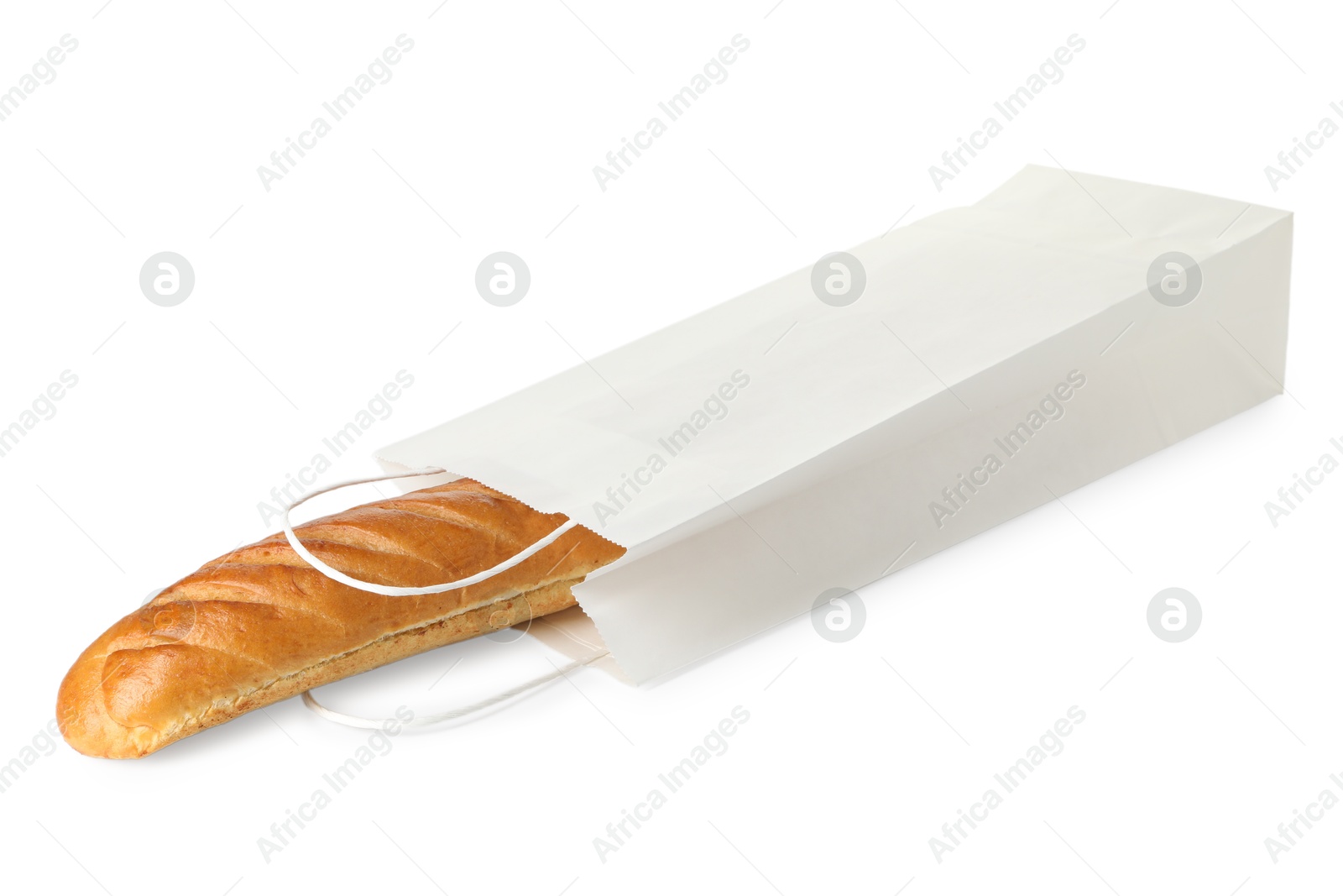 Photo of Freshly baked baguette in paper bag isolated on white