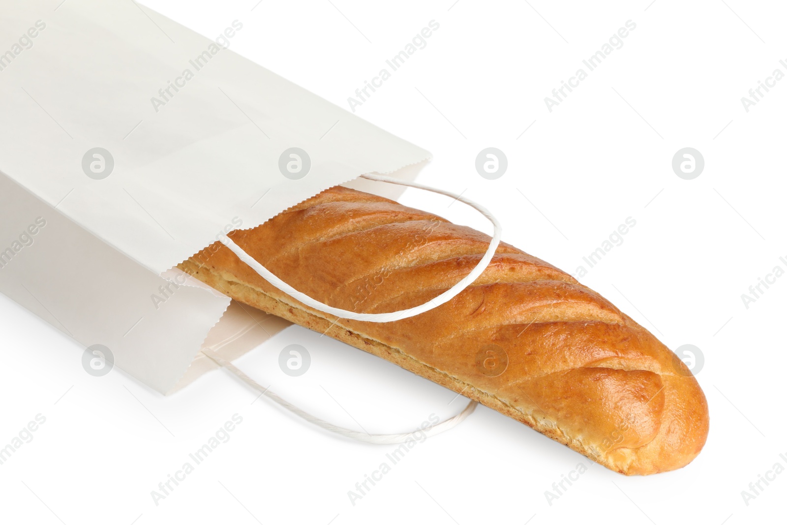 Photo of Freshly baked baguette in paper bag isolated on white