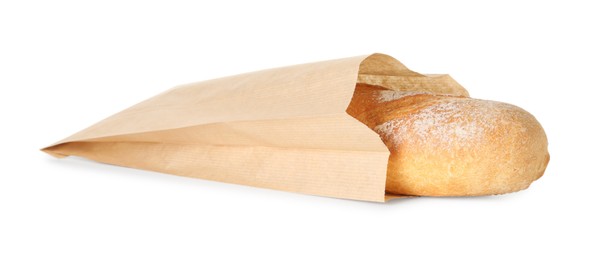 Photo of Freshly baked baguette in paper bag isolated on white