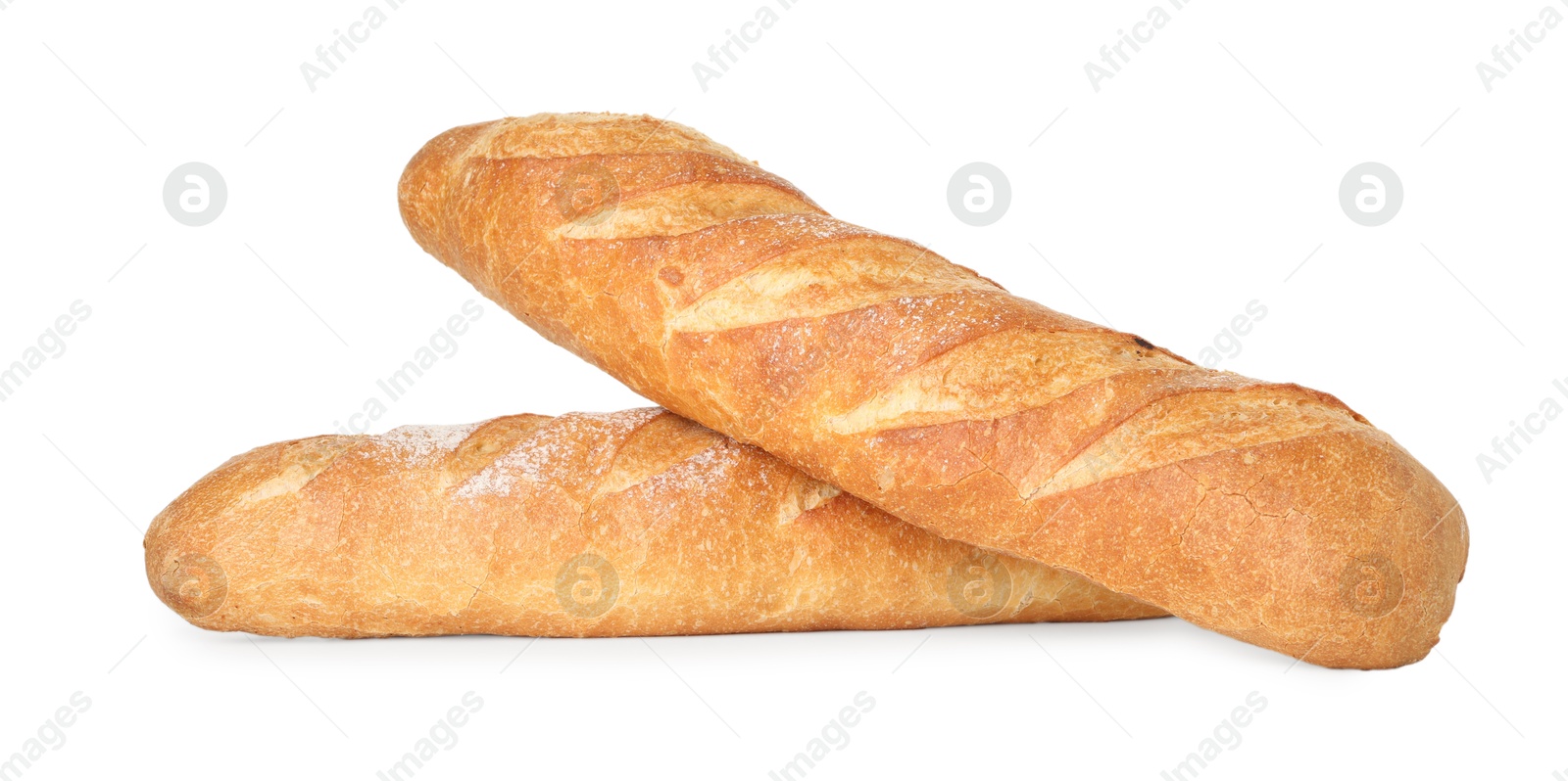 Photo of Two freshly baked baguettes isolated on white