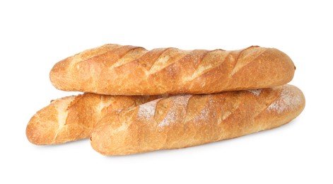 Photo of Three freshly baked baguettes isolated on white