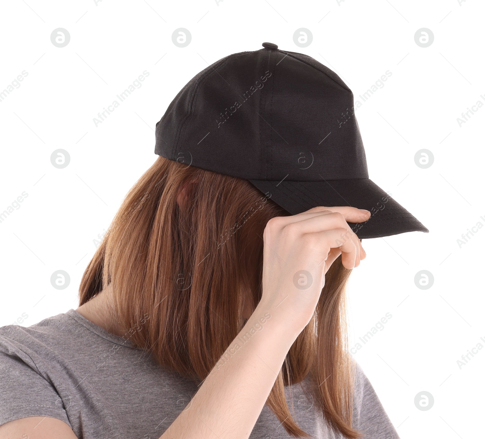 Photo of Woman in stylish baseball cap on white background. Mockup for design