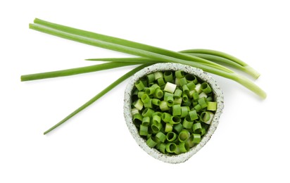 Photo of Fresh green onions isolated on white, top view