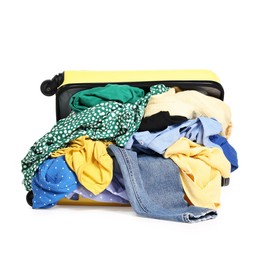 Photo of Suitcase full of different messy clothes isolated on white