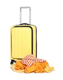 Photo of Suitcase and messy pile of clothes isolated on white