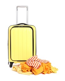 Photo of Suitcase and messy pile of clothes isolated on white