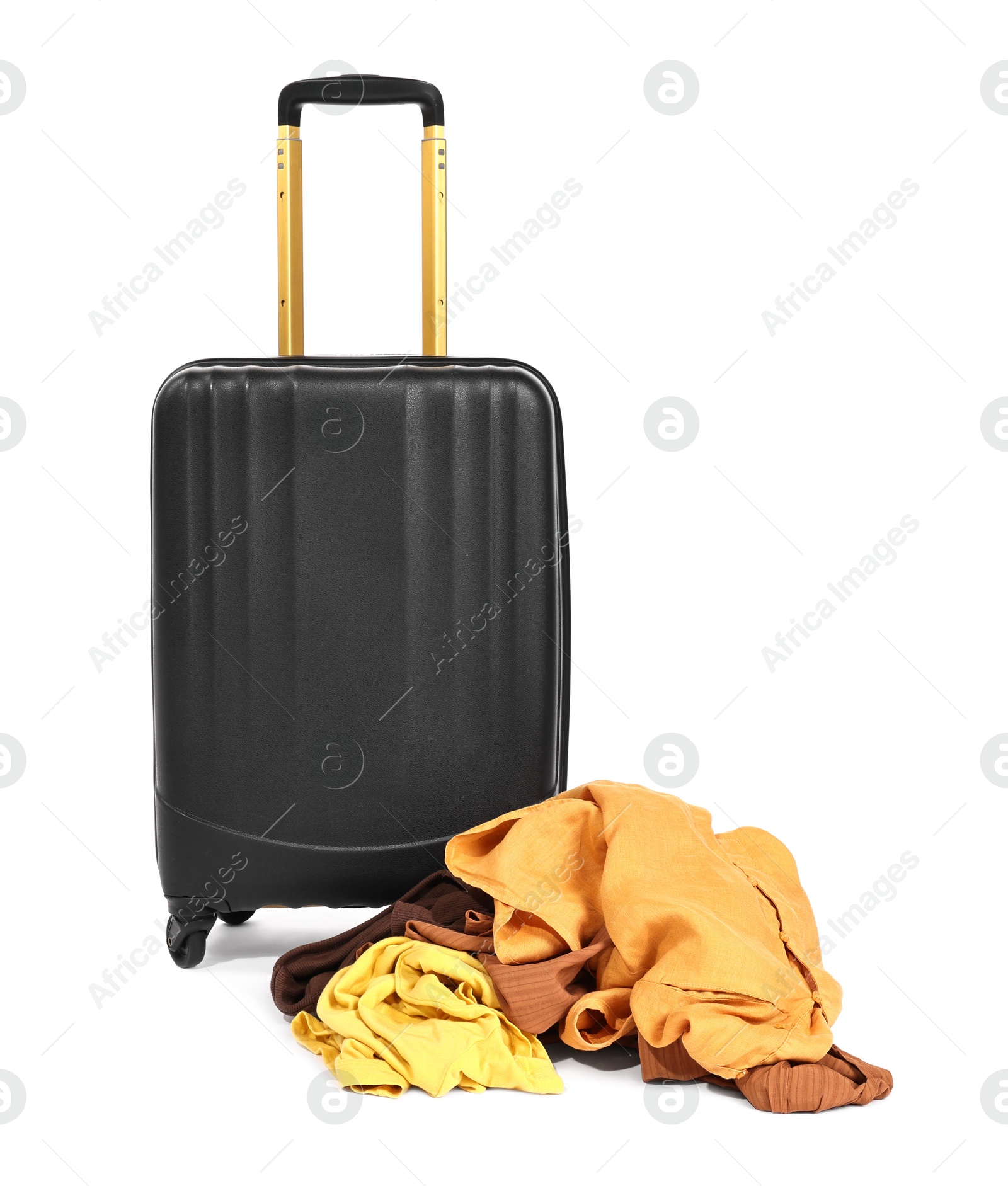 Photo of Suitcase and messy pile of clothes isolated on white