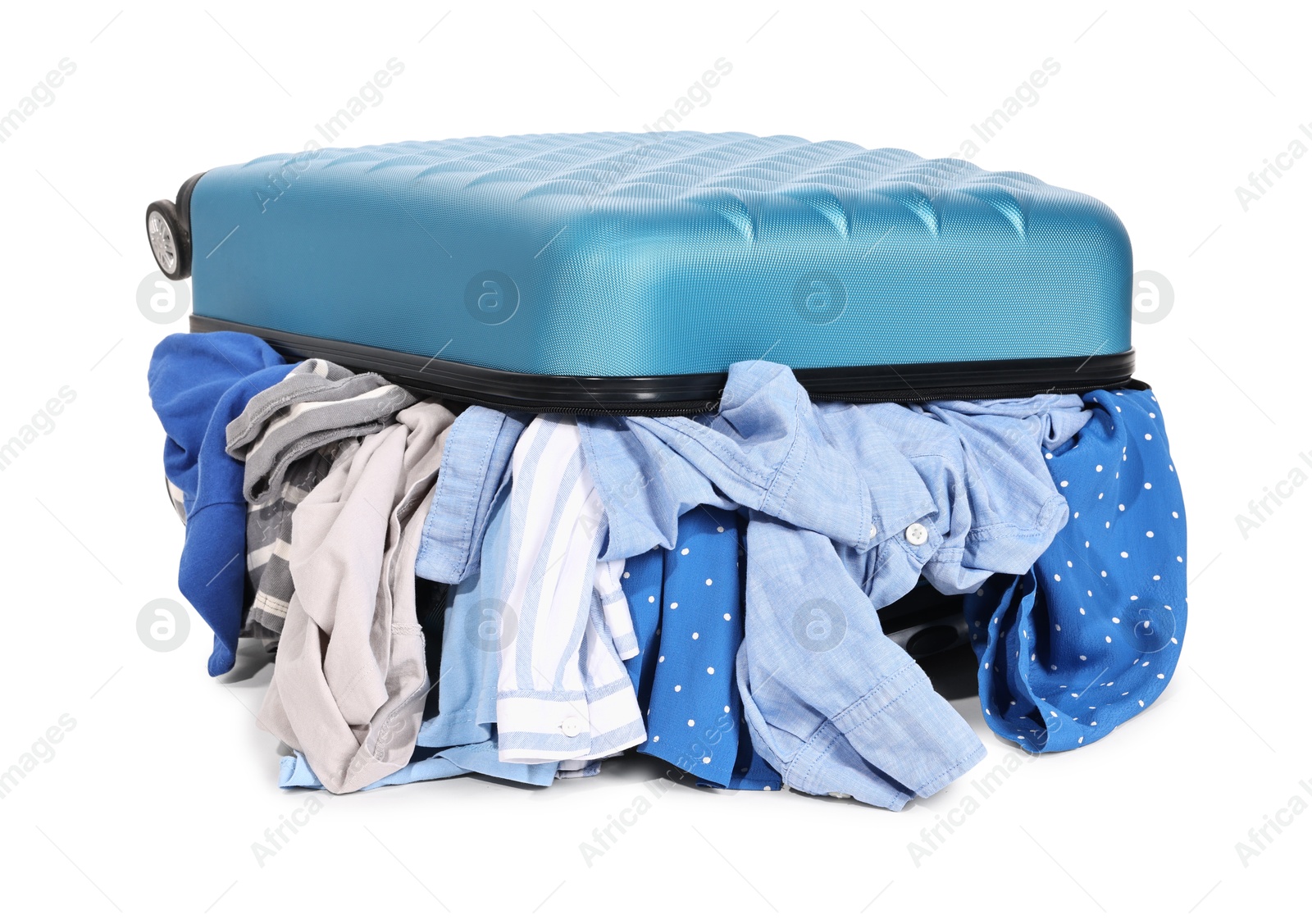 Photo of Packed suitcase full of clothes isolated on white