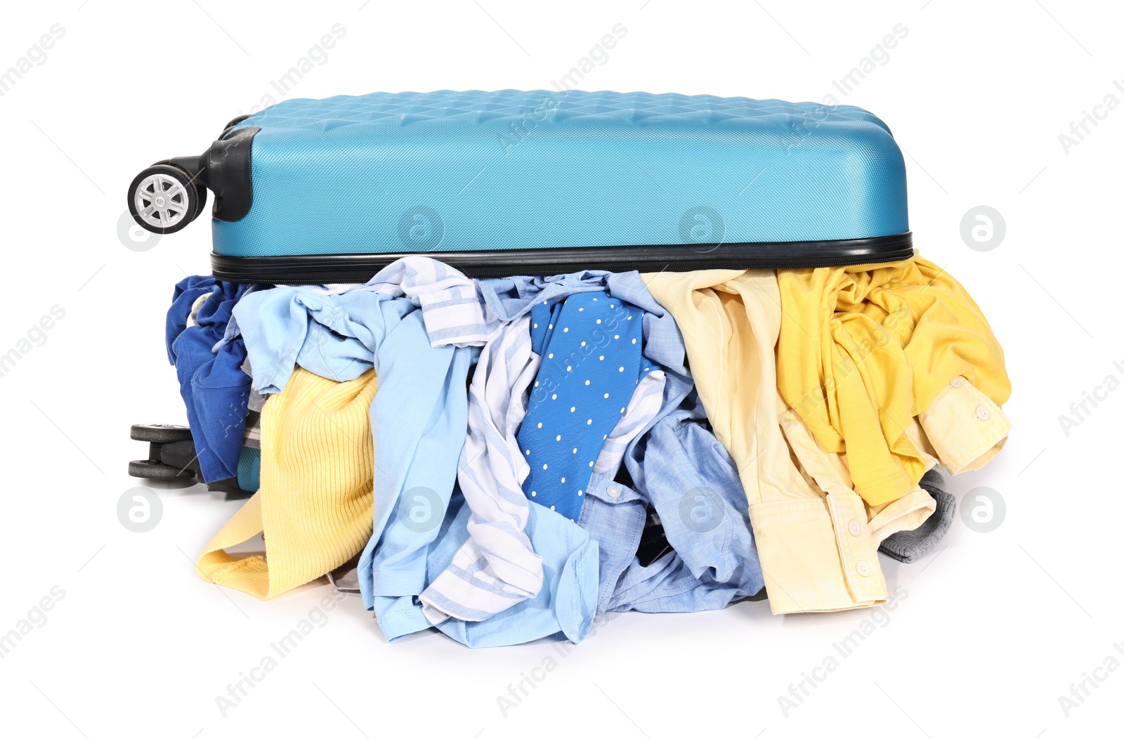 Photo of Packed suitcase full of clothes isolated on white