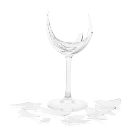 Photo of Pieces of broken wine glass isolated on white