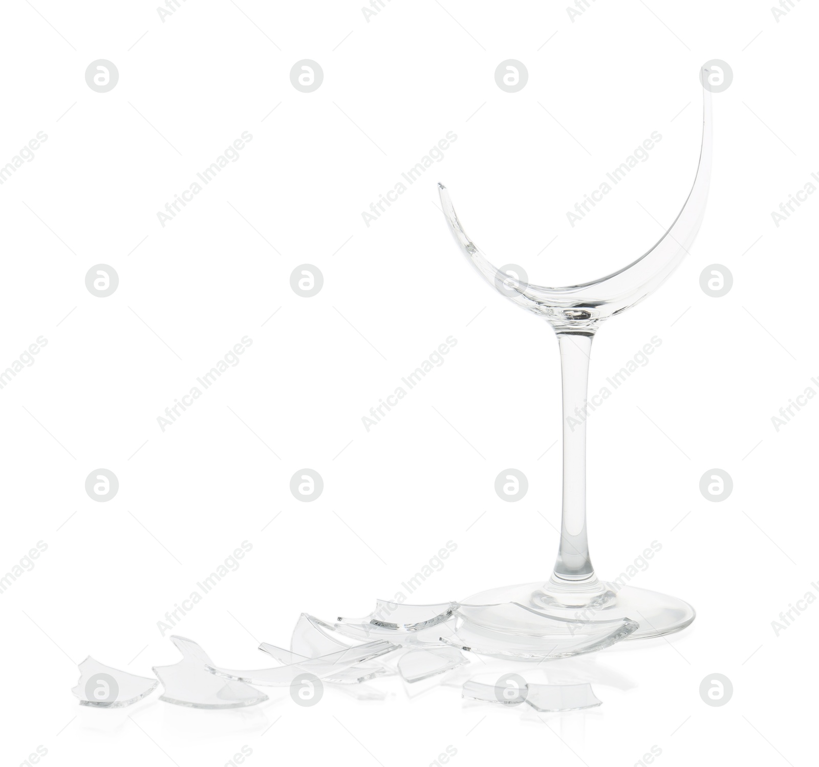 Photo of Pieces of broken wine glass isolated on white