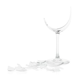 Photo of Pieces of broken wine glass isolated on white