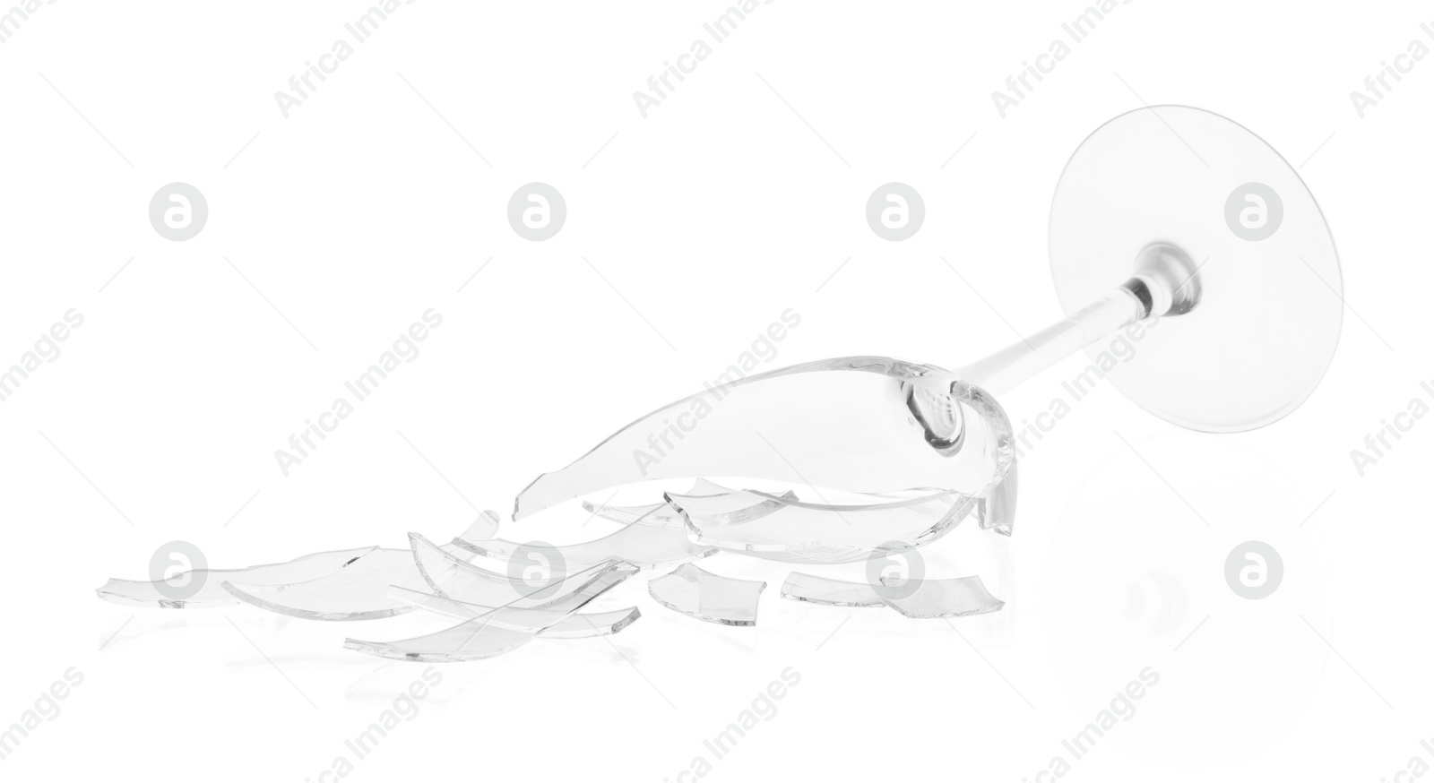 Photo of Pieces of broken wine glass isolated on white