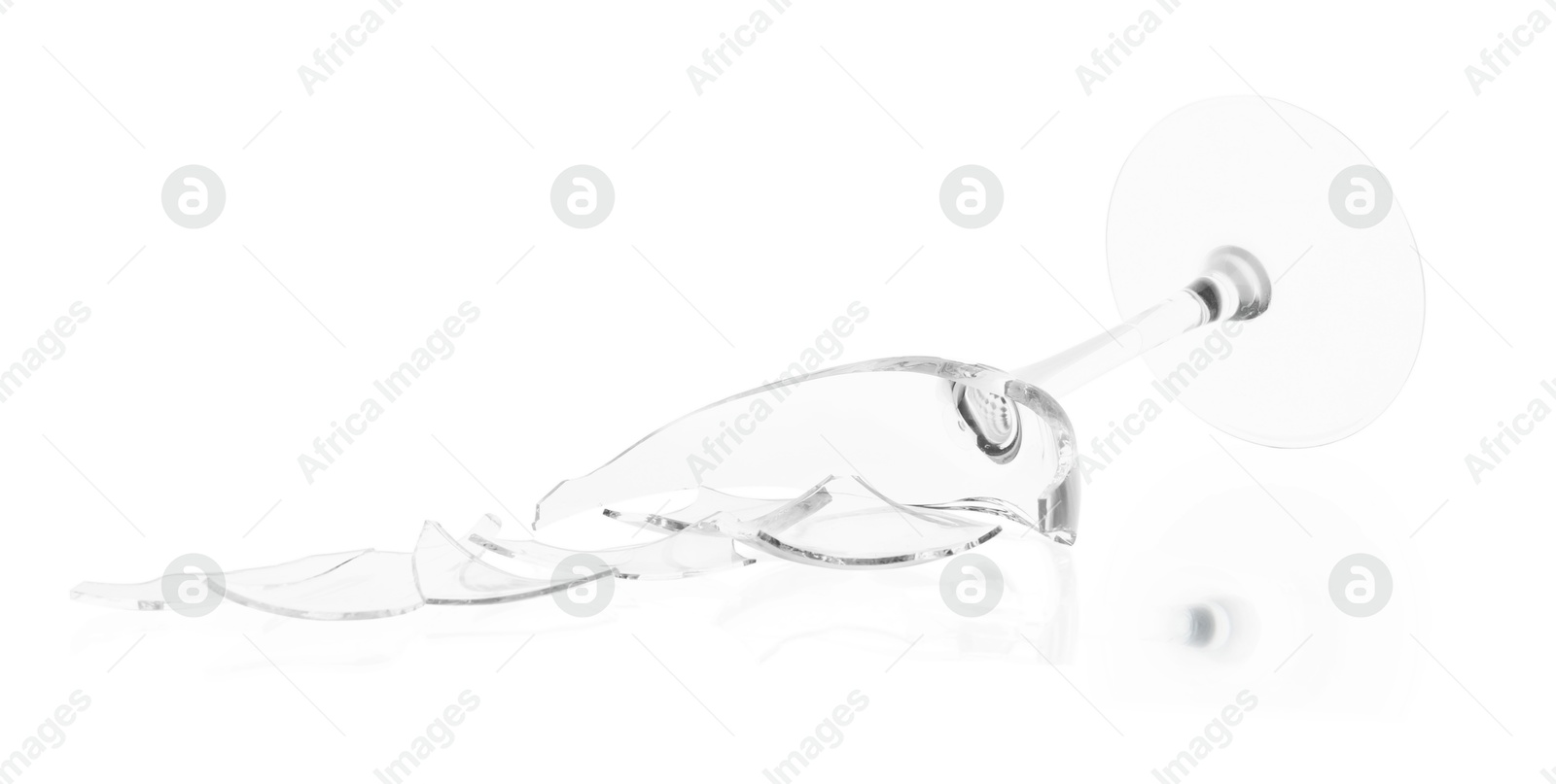 Photo of Pieces of broken wine glass isolated on white