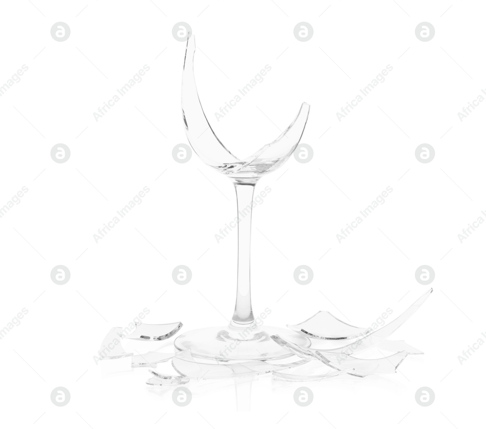 Photo of Pieces of broken wine glass isolated on white