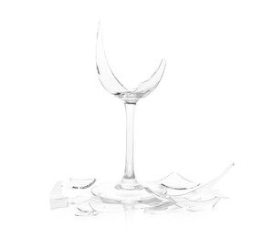 Photo of Pieces of broken wine glass isolated on white