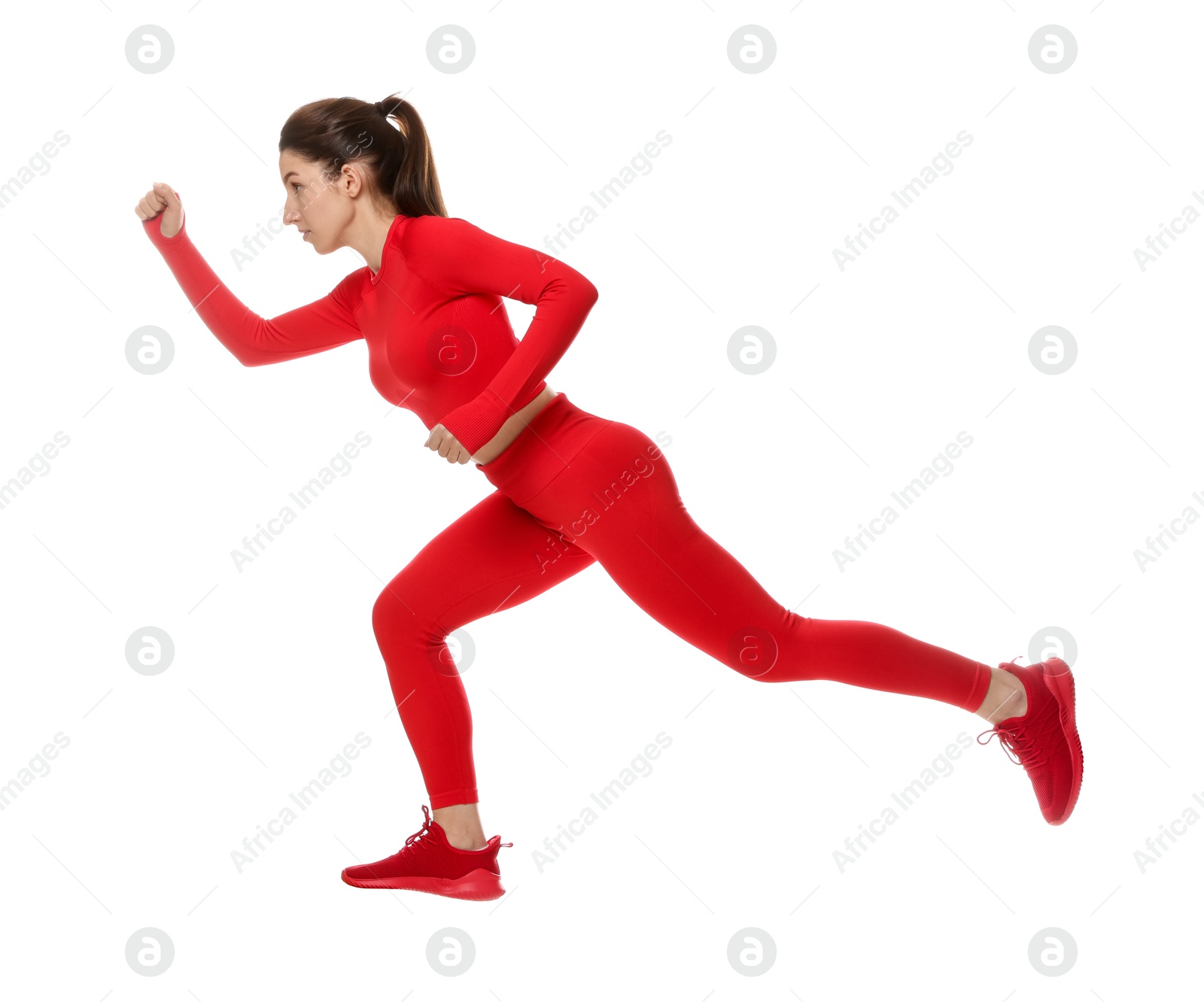 Photo of Woman in sportswear exercising on white background