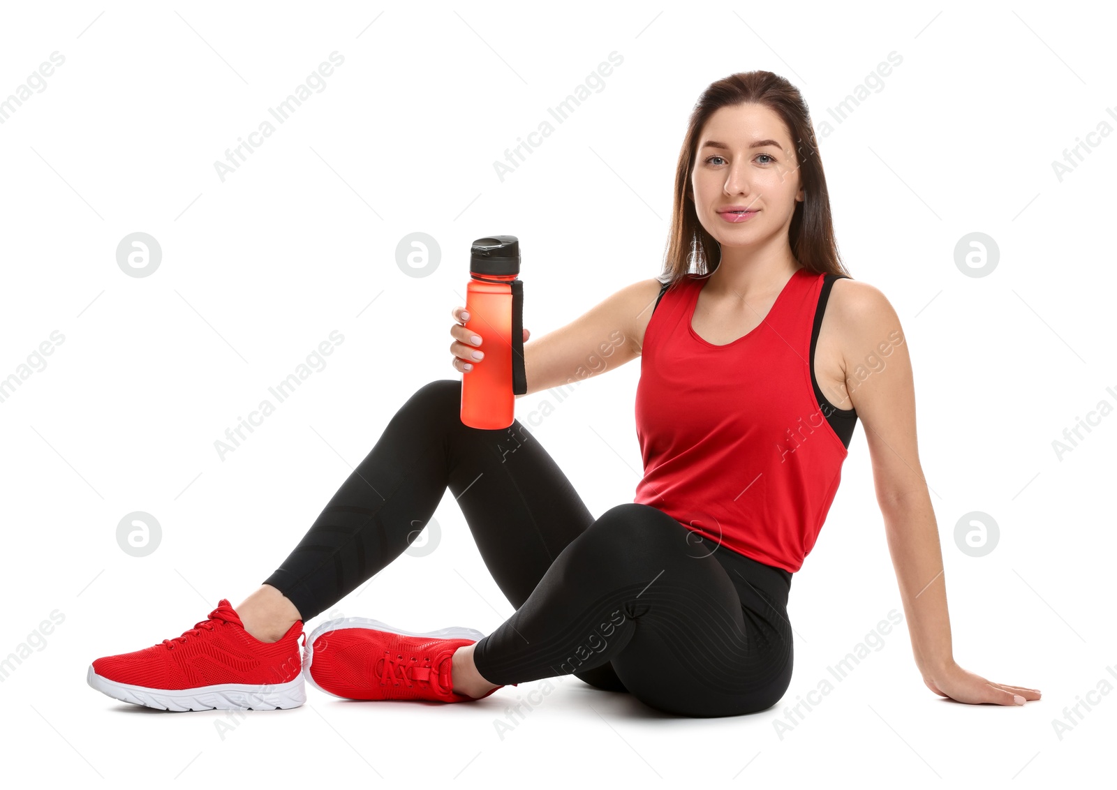 Photo of Woman in sportswear with bottle of water on white background