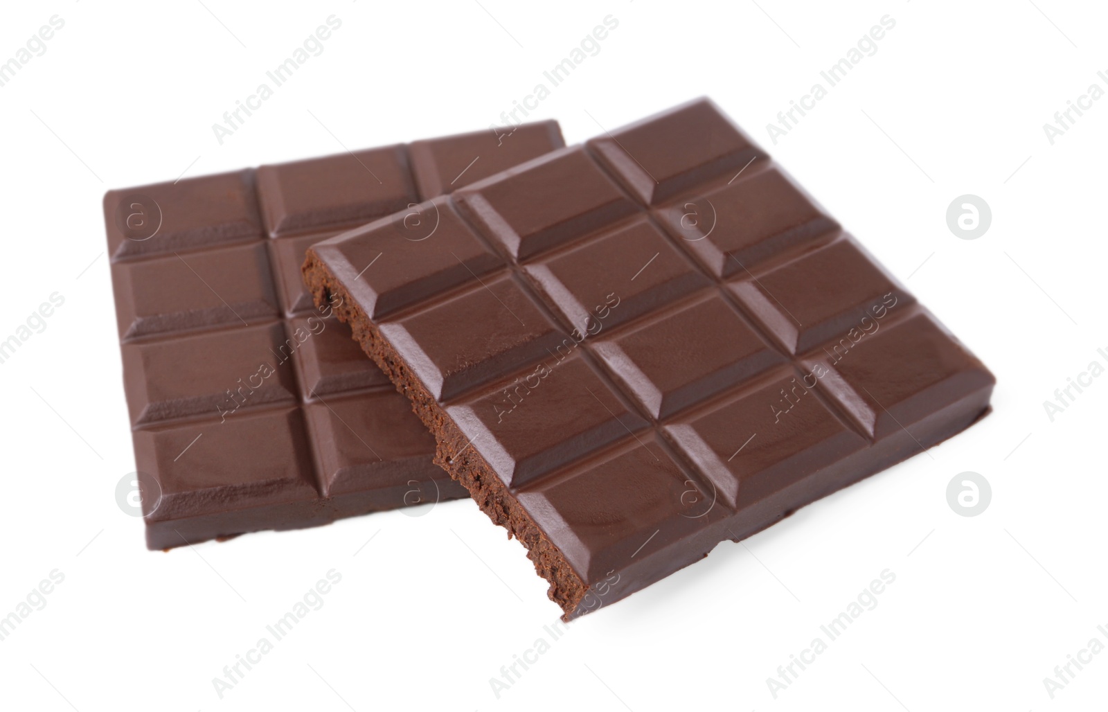 Photo of Pieces of delicious dark chocolate bar isolated on white