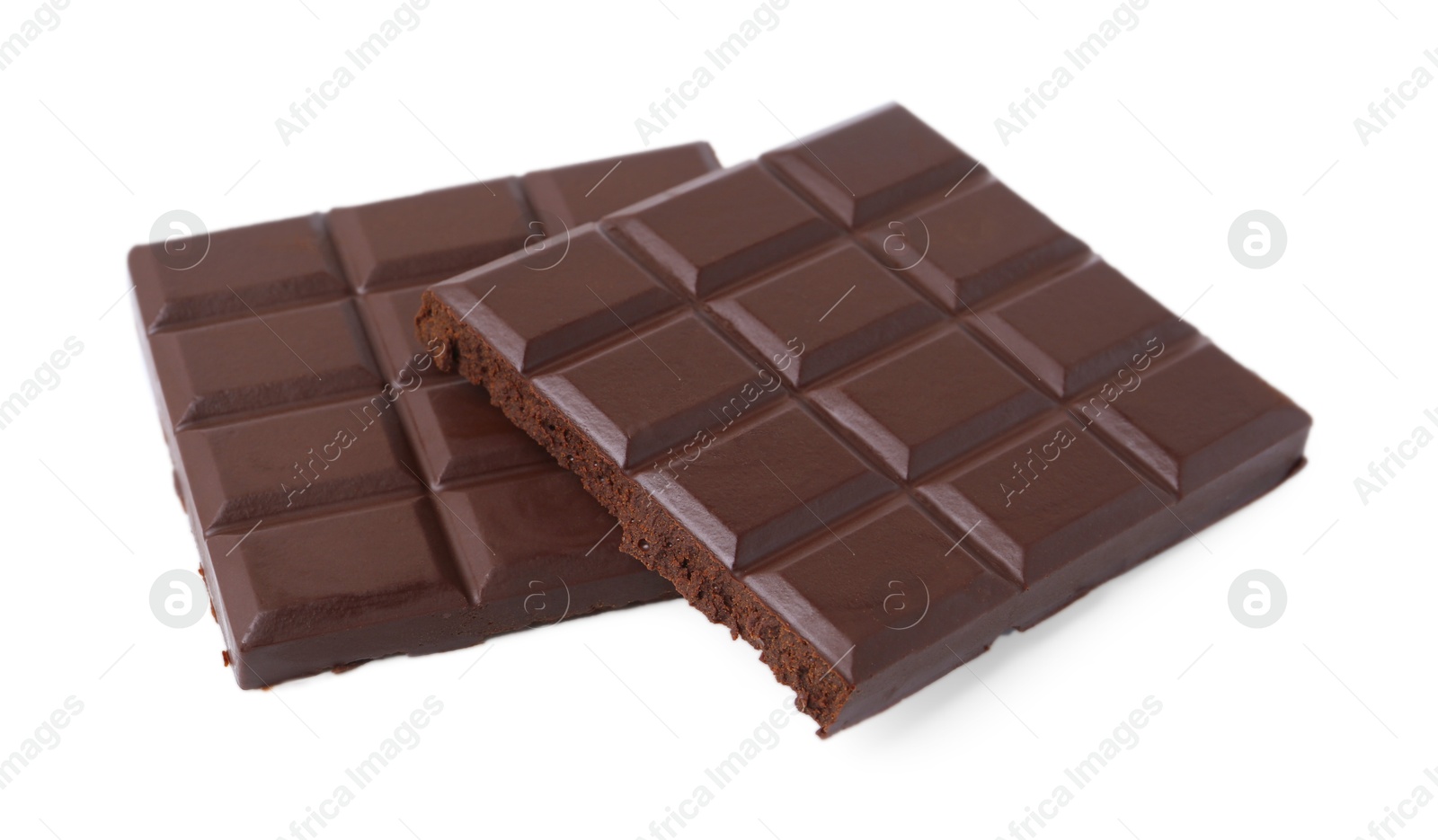 Photo of Pieces of delicious dark chocolate bar isolated on white