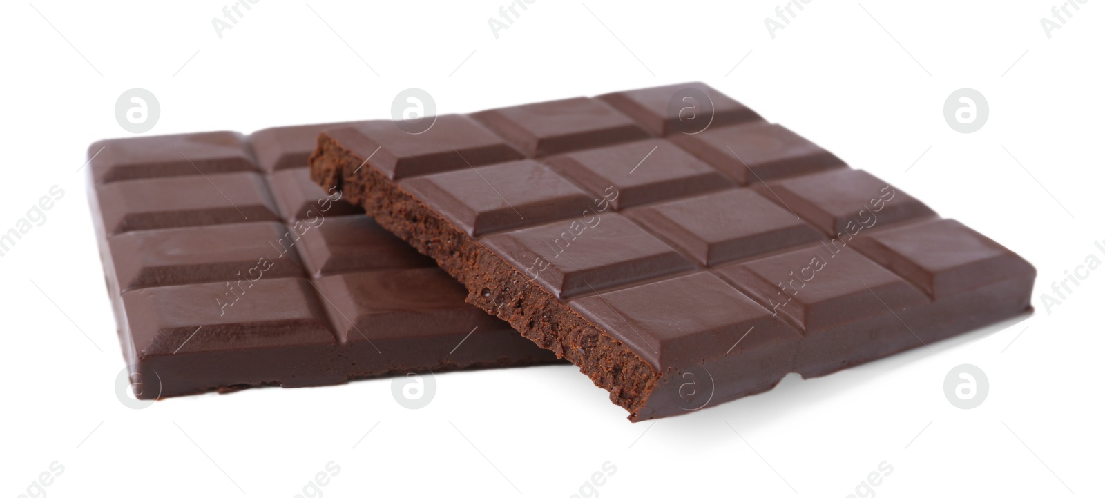 Photo of Pieces of delicious dark chocolate bar isolated on white