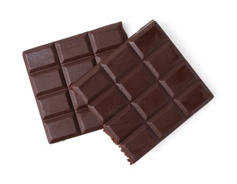 Photo of Pieces of delicious dark chocolate bar isolated on white, top view