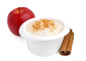 Photo of Delicious rice pudding with cinnamon and apple isolated on white