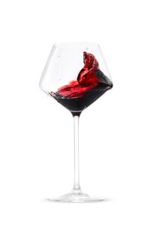 Photo of Red wine splashing in glass on white background