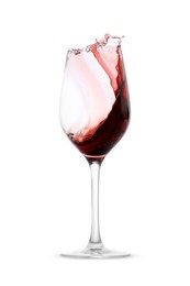 Photo of Red wine splashing in glass on white background