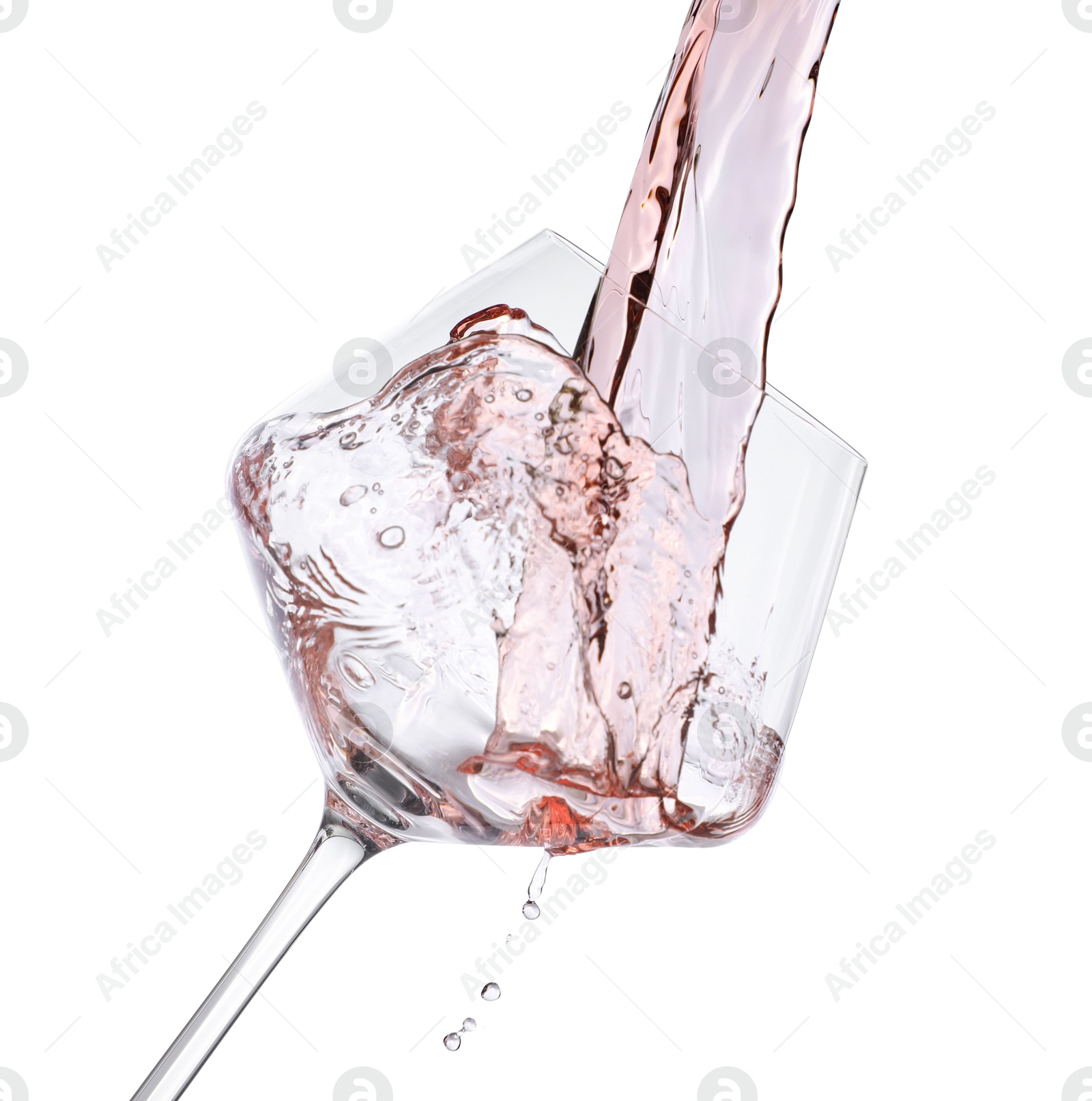 Photo of Pouring rose wine into glass isolated on white