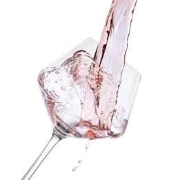 Photo of Pouring rose wine into glass isolated on white