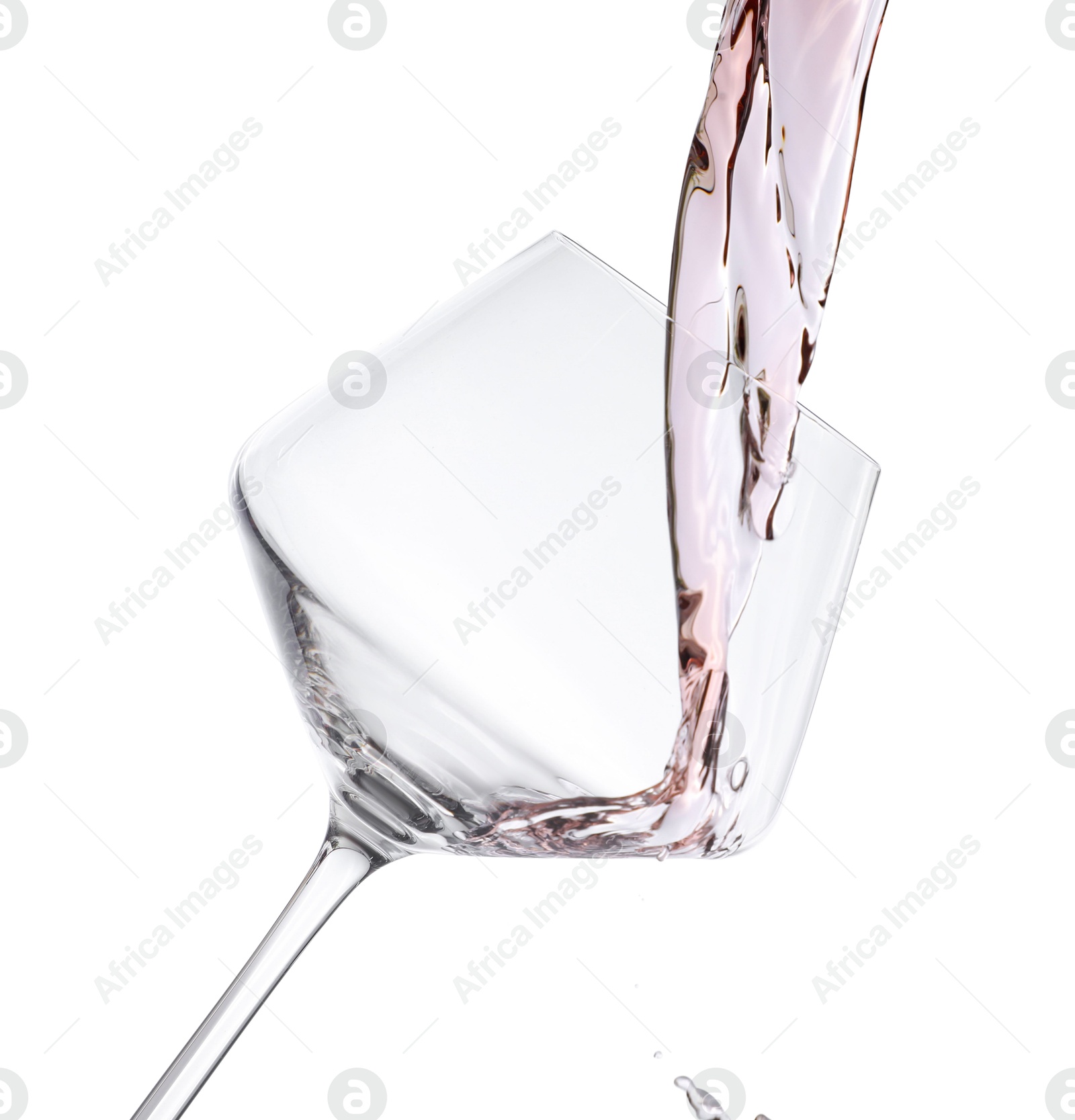 Photo of Pouring rose wine into glass isolated on white