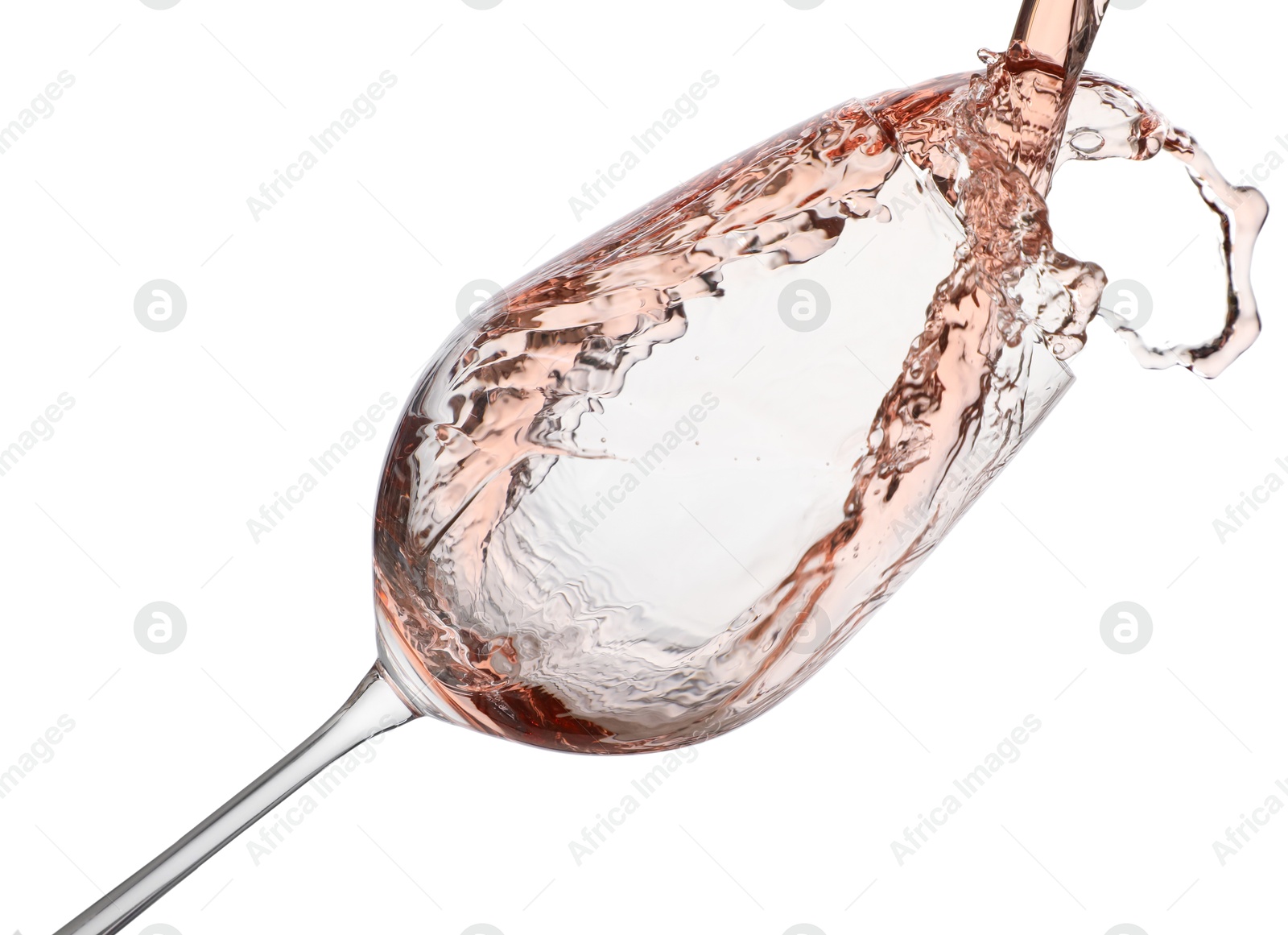 Photo of Pouring rose wine into glass isolated on white