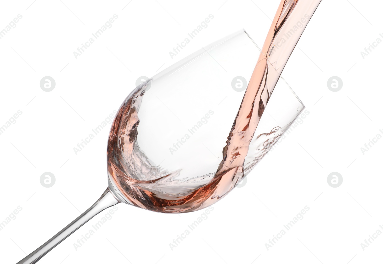 Photo of Pouring rose wine into glass isolated on white