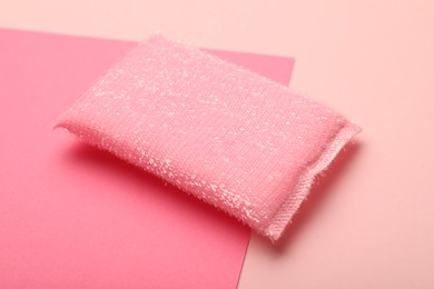 Photo of One sponge on pink background, closeup view