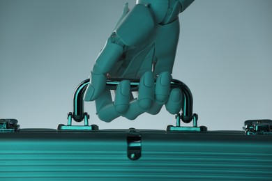 Photo of Artificial intelligence. Robot hand with metal case on grey background, closeup