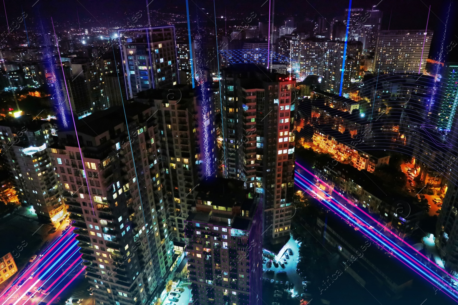 Image of Smart city concept. Digital signals and patterns on buildings and streets connecting town into network