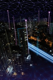 Image of Smart city concept. Signals from buildings connecting to digital pattern above town