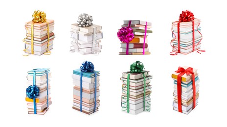 Image of Stacked books decorated with bows isolated on white. Nice holiday gift