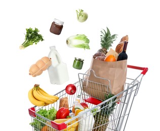 Image of Groceries falling into shopping cart on white background