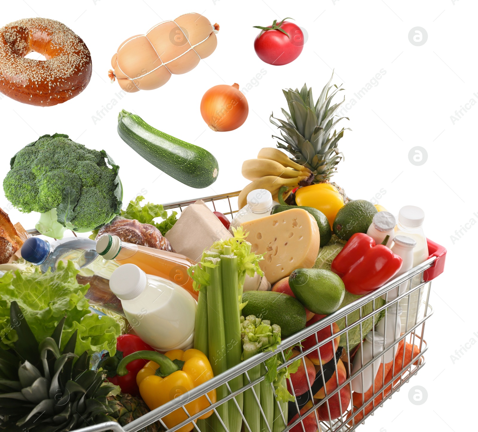 Image of Groceries falling into shopping cart on white background