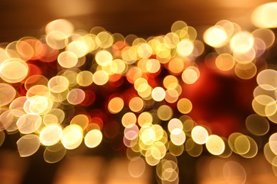 Photo of Blurred view of festive lights on as background, bokeh effect