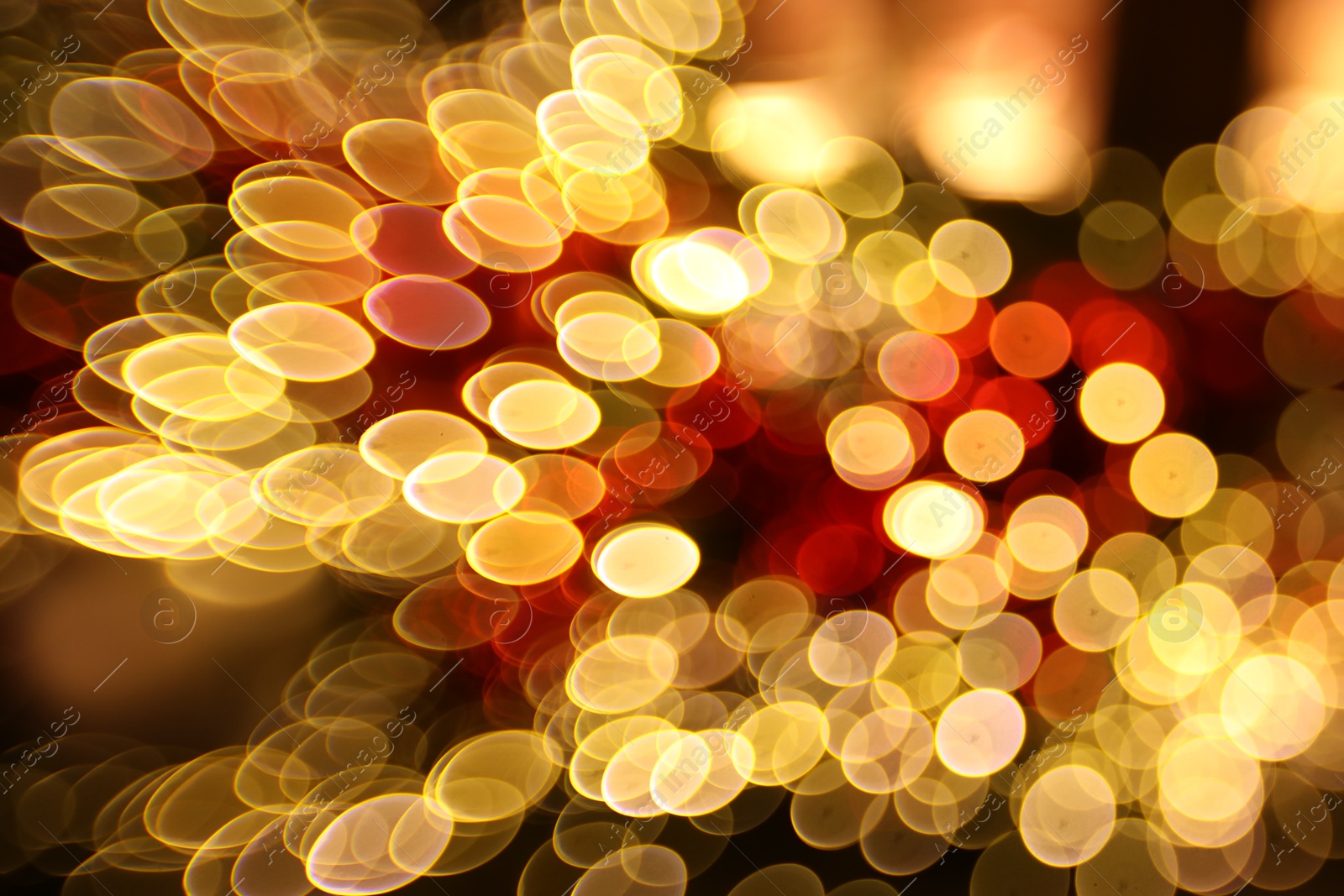 Photo of Blurred view of festive lights on as background, bokeh effect