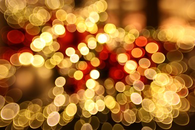 Photo of Blurred view of festive lights on as background, bokeh effect