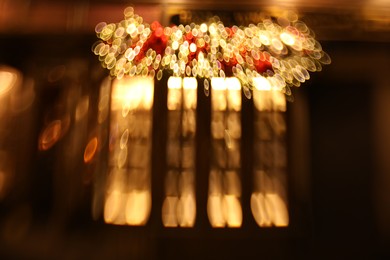 Photo of Blurred view of city street with lights, bokeh effect