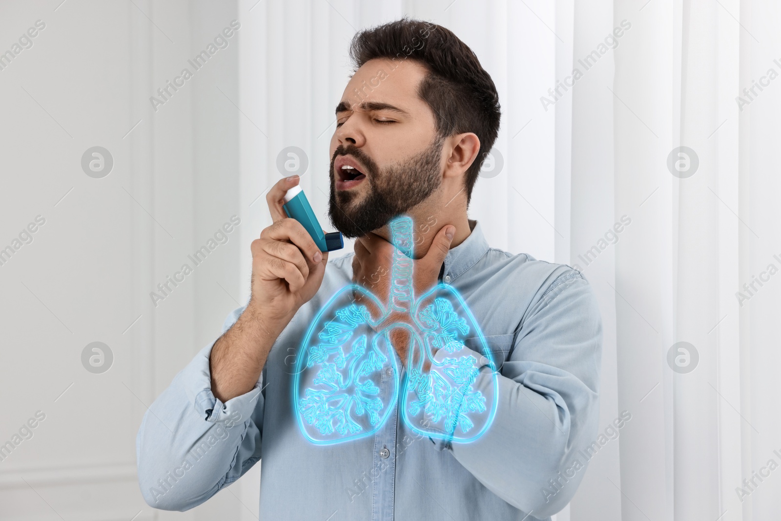 Image of Young with asthma man using spray at home. Illustration of lungs