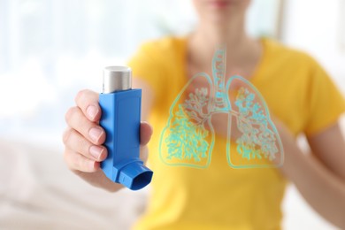 Image of Woman holding asthma inhaler indoors, selective focus. Illustration of lungs