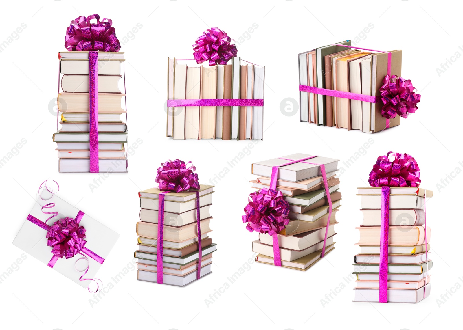 Image of Books decorated with magenta color bows isolated on white. Nice holiday gift