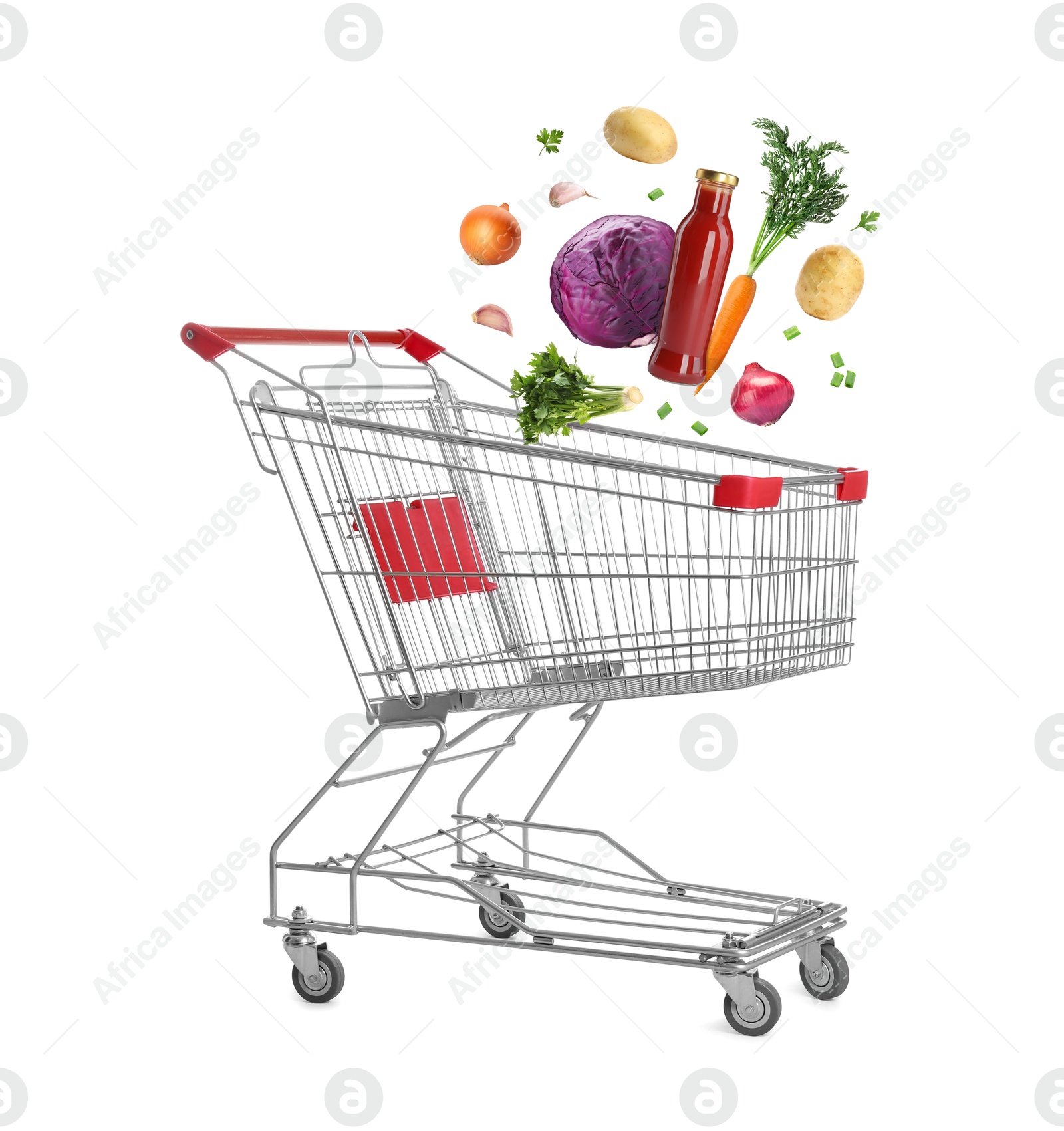 Image of Groceries falling into shopping cart on white background