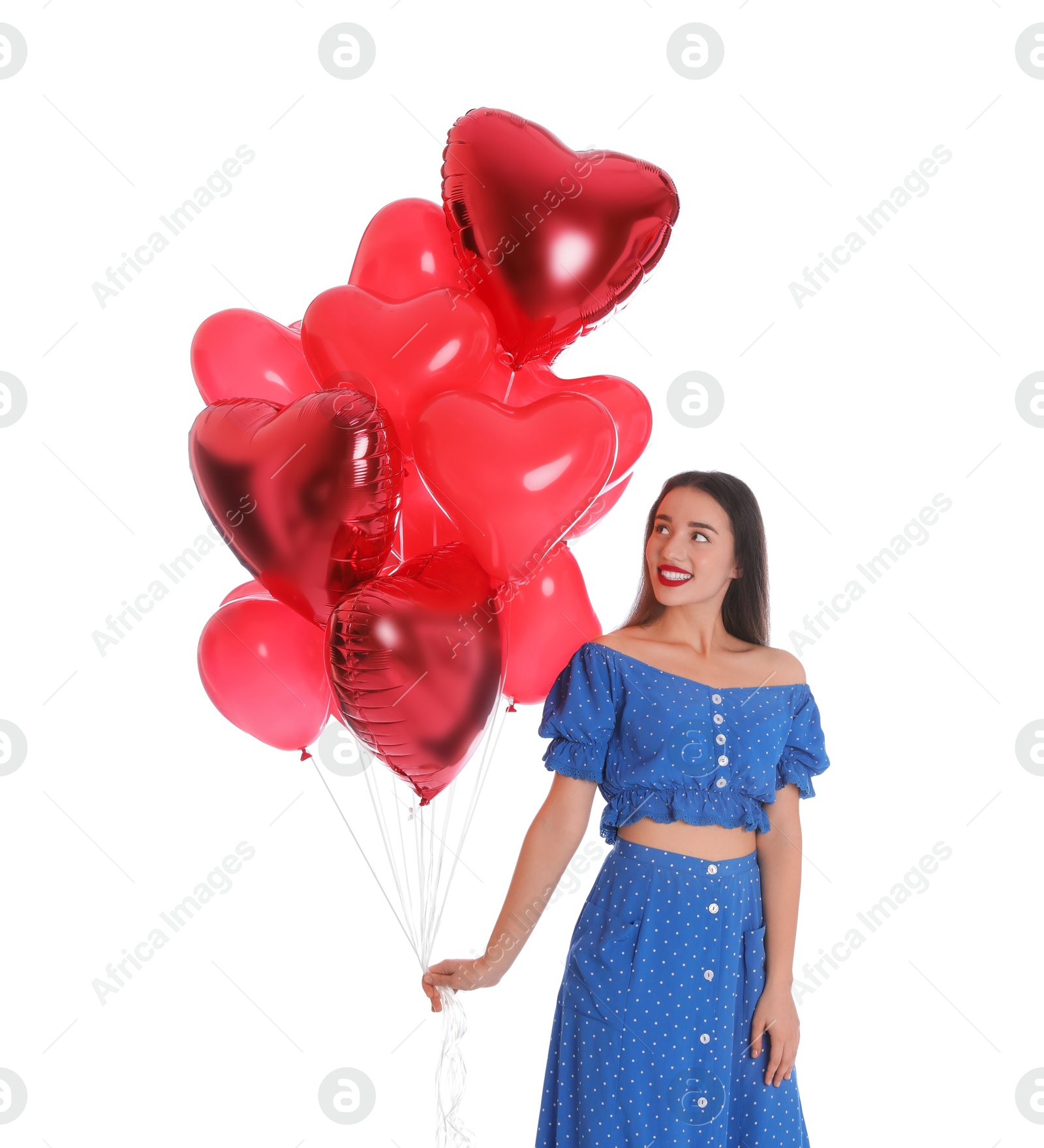 Photo of Beautiful young woman with heart shaped balloons isolated on white. Valentine's day celebration